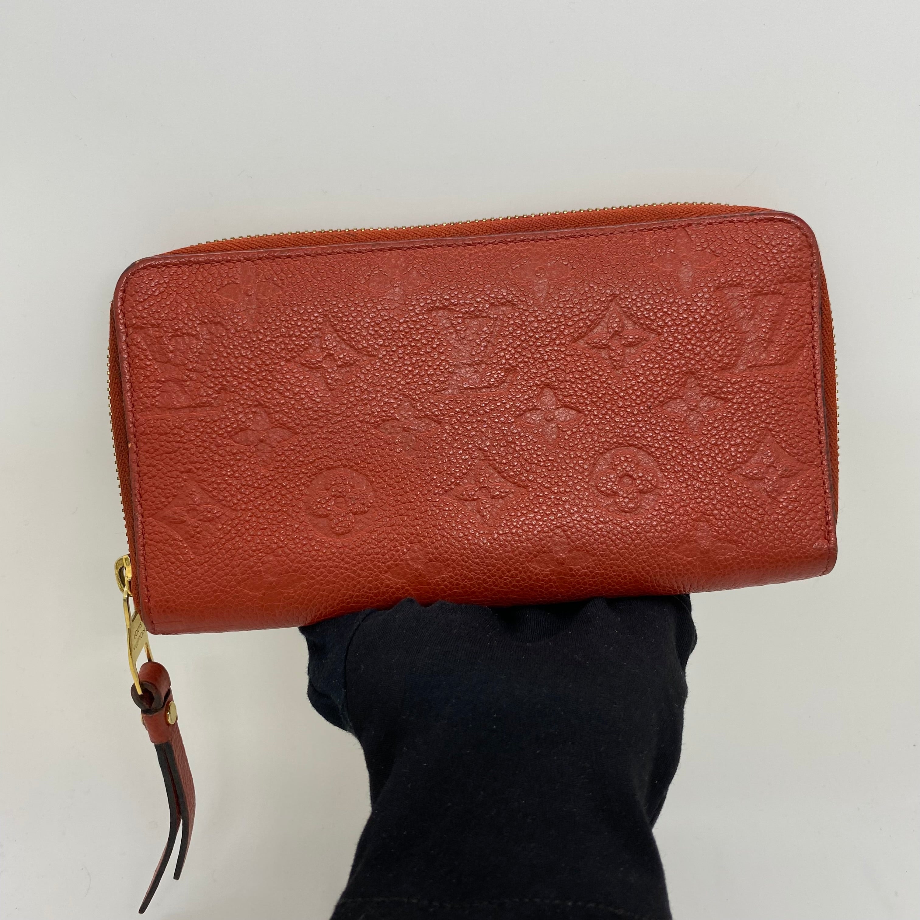 LOUIS VUITTON ORANGE SLG EMPREINTE ZIPPY VERTICAL WALLET